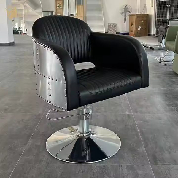 Industrial-Style Black Leather Barber Chair with Riveted Metal Sides and Hydraulic Base