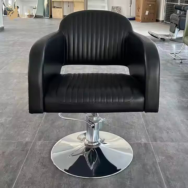 Industrial-Style Black Leather Barber Chair with Riveted Metal Sides and Hydraulic Base