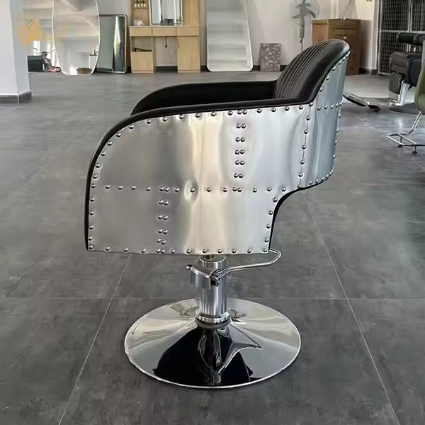 Industrial-Style Black Leather Barber Chair with Riveted Metal Sides and Hydraulic Base