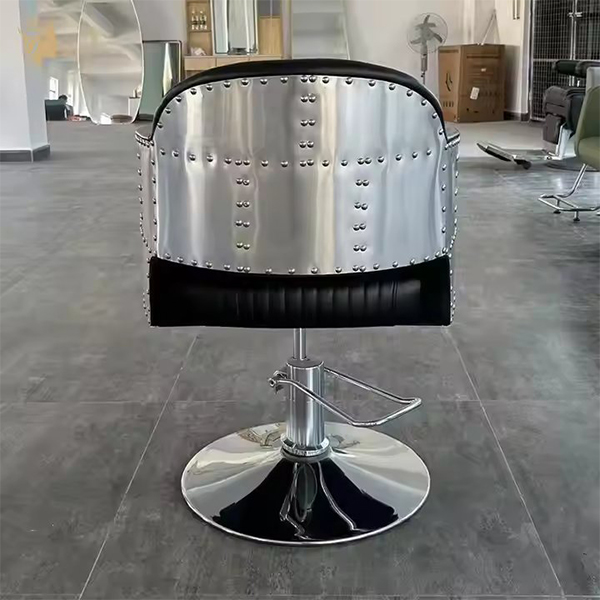 Industrial-Style Black Leather Barber Chair with Riveted Metal Sides and Hydraulic Base